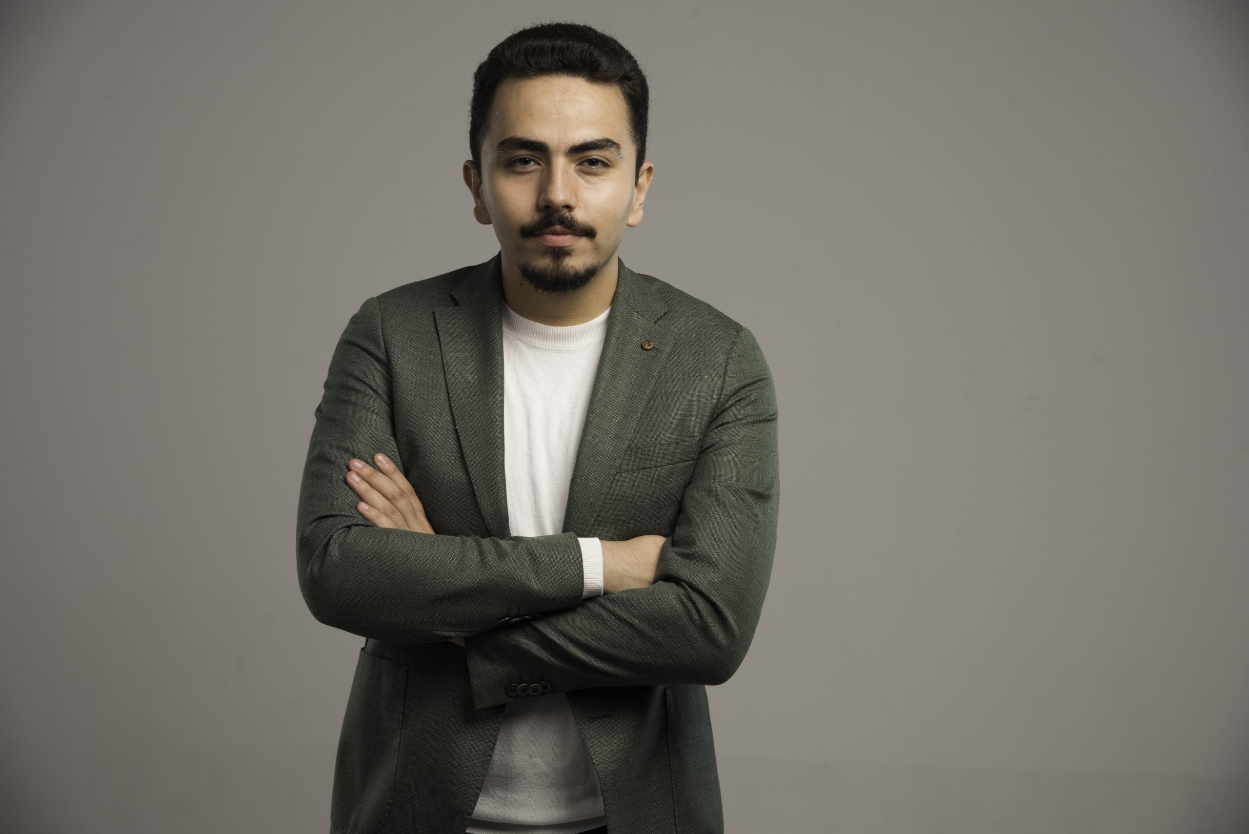 A businessman in dress code posing as a professional. High quality photo